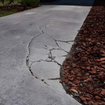 Should You Seal or Replace a Cracked Driveway?