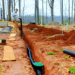 Which Is Better for Drainage: French Drains or Dry Wells?