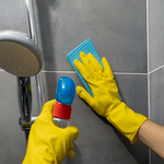 How Can You Remove Mold From Bathroom Surfaces Using DIY Methods?